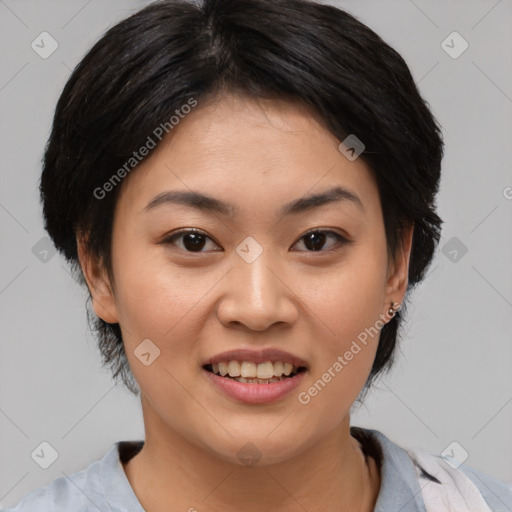 Joyful asian young-adult female with medium  black hair and brown eyes