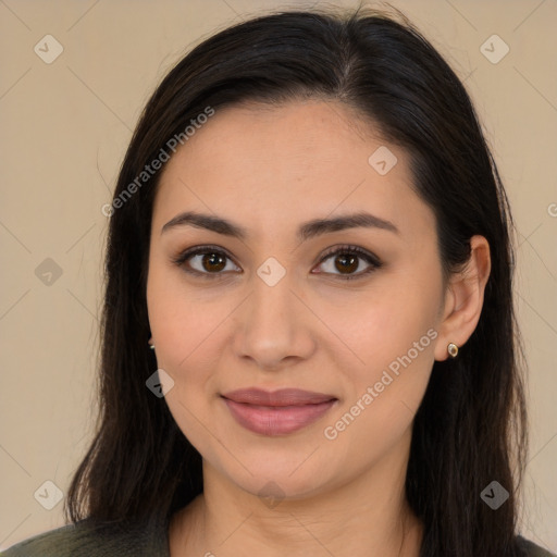 Joyful latino young-adult female with long  brown hair and brown eyes