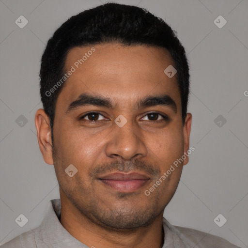 Joyful latino young-adult male with short  black hair and brown eyes