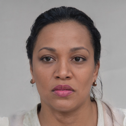 Neutral black young-adult female with short  black hair and brown eyes