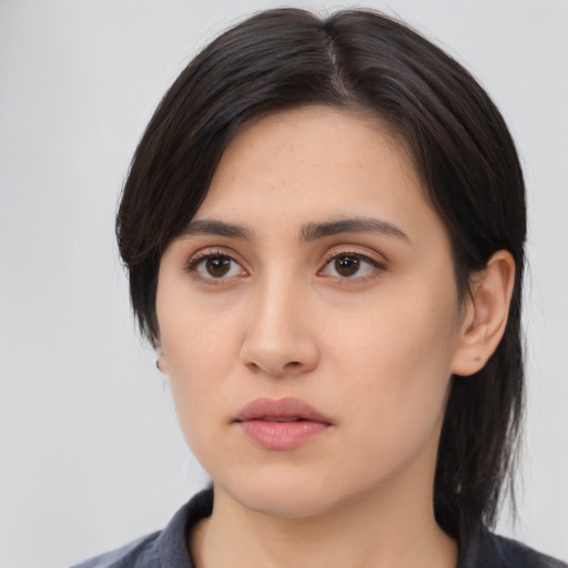 Neutral asian young-adult female with medium  black hair and brown eyes