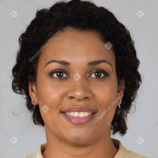 Joyful black young-adult female with medium  brown hair and brown eyes