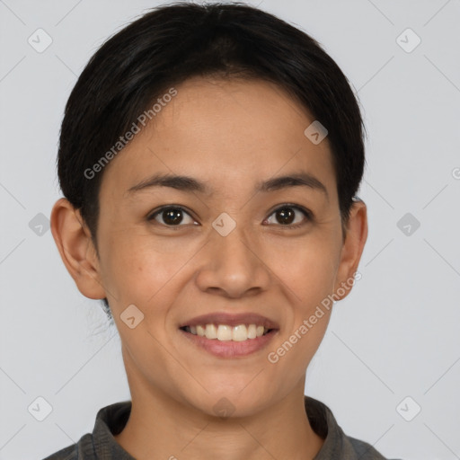 Joyful asian young-adult female with short  brown hair and brown eyes