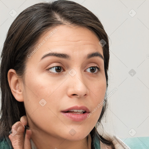 Neutral white young-adult female with long  brown hair and brown eyes