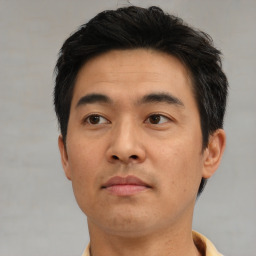 Neutral asian young-adult male with short  black hair and brown eyes