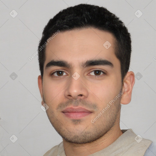 Neutral white young-adult male with short  black hair and brown eyes