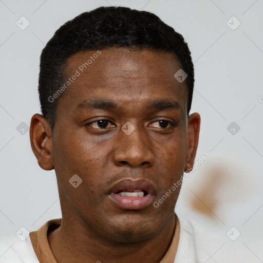 Neutral black young-adult male with short  black hair and brown eyes