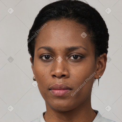 Neutral black young-adult female with short  black hair and brown eyes