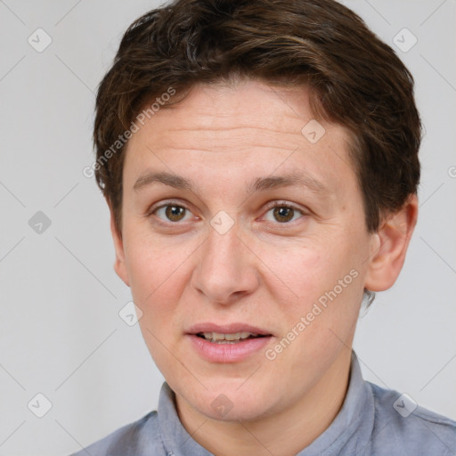 Joyful white adult female with short  brown hair and grey eyes