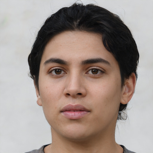 Neutral latino young-adult female with short  black hair and brown eyes