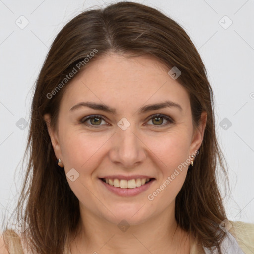 Joyful white young-adult female with long  brown hair and grey eyes