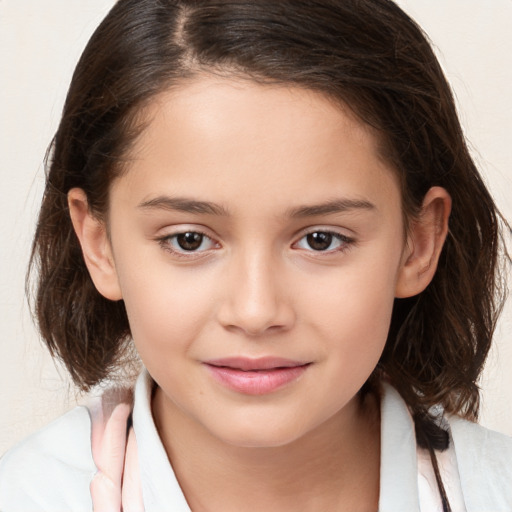 Joyful white child female with medium  brown hair and brown eyes