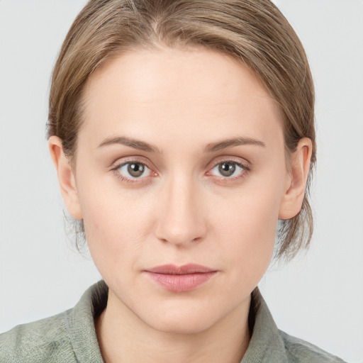 Neutral white young-adult female with medium  brown hair and blue eyes