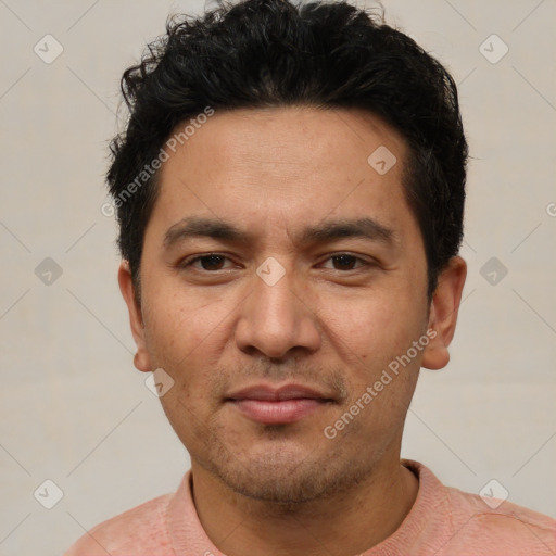 Joyful white adult male with short  black hair and brown eyes