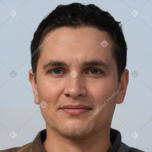 Joyful white young-adult male with short  brown hair and brown eyes