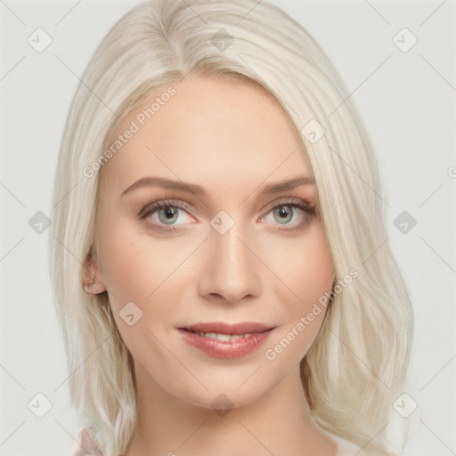 Joyful white young-adult female with long  blond hair and blue eyes