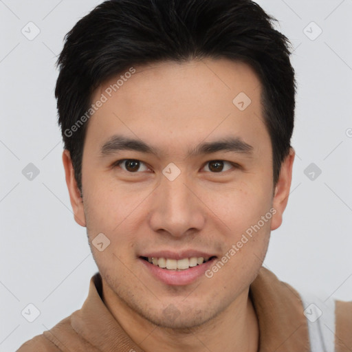 Joyful asian young-adult male with short  brown hair and brown eyes