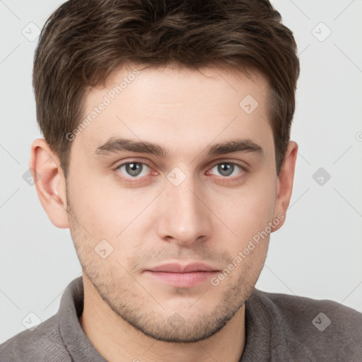 Neutral white young-adult male with short  brown hair and grey eyes