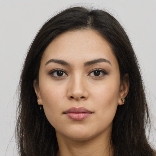 Neutral asian young-adult female with long  brown hair and brown eyes