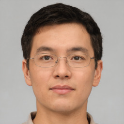 Neutral asian young-adult male with short  brown hair and brown eyes