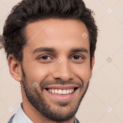 Joyful white young-adult male with short  black hair and brown eyes