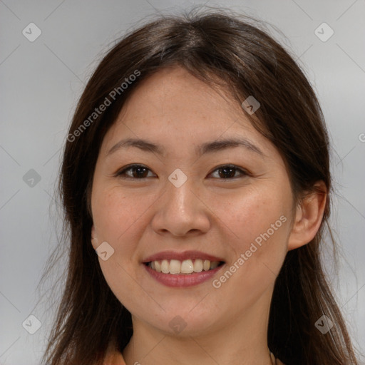 Joyful white young-adult female with long  brown hair and brown eyes