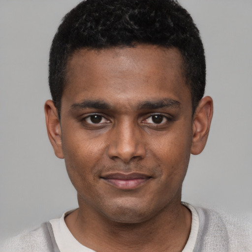 Neutral black young-adult male with short  black hair and brown eyes