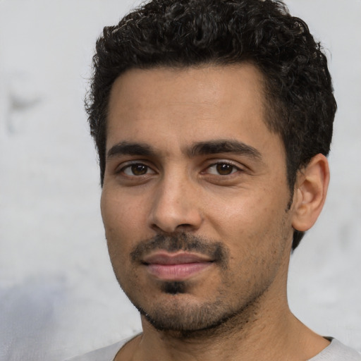Neutral white young-adult male with short  black hair and brown eyes