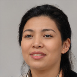 Joyful asian young-adult female with medium  brown hair and brown eyes