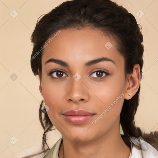 Joyful latino young-adult female with medium  brown hair and brown eyes