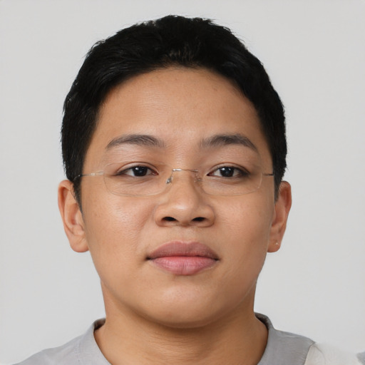 Joyful asian young-adult female with short  brown hair and brown eyes