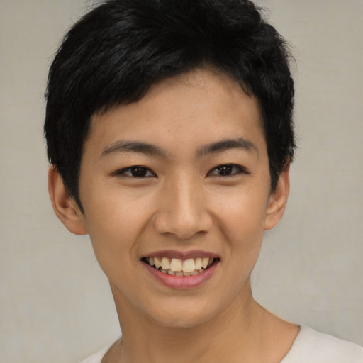 Joyful asian young-adult female with short  black hair and brown eyes
