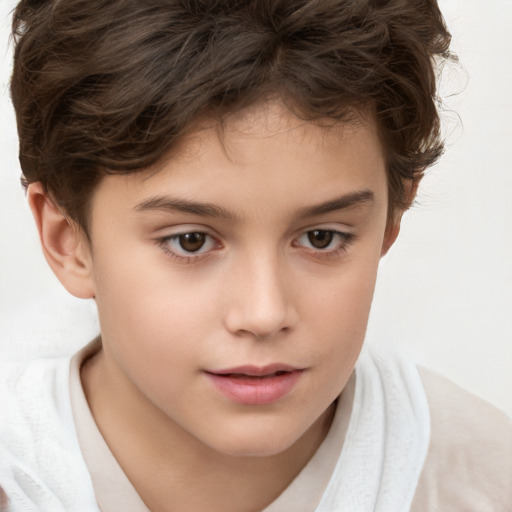 Joyful white child female with short  brown hair and brown eyes