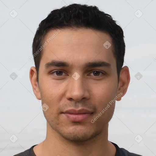 Neutral latino young-adult male with short  black hair and brown eyes