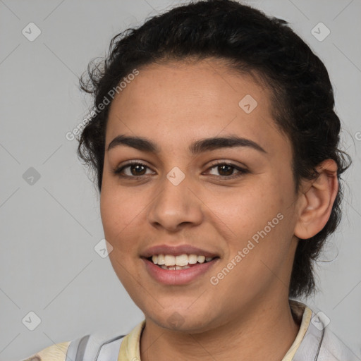 Joyful latino young-adult female with medium  brown hair and brown eyes