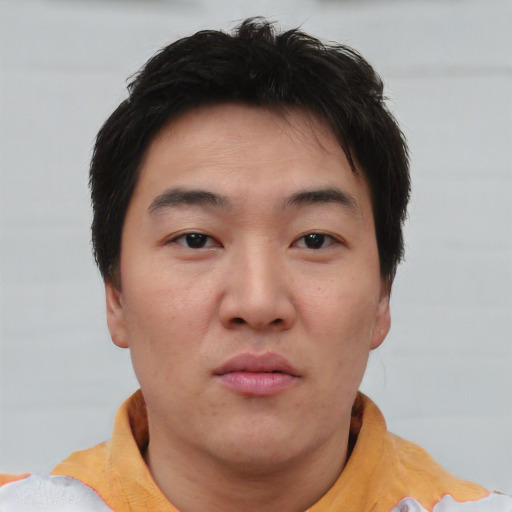 Neutral asian young-adult male with short  brown hair and brown eyes