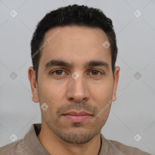 Neutral white young-adult male with short  black hair and brown eyes