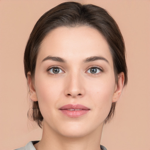 Neutral white young-adult female with medium  brown hair and brown eyes