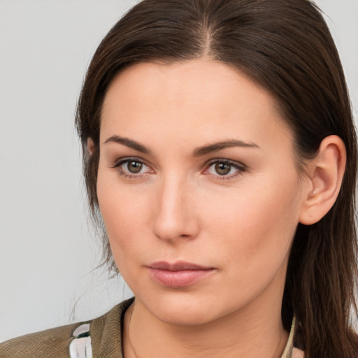 Neutral white young-adult female with medium  brown hair and brown eyes