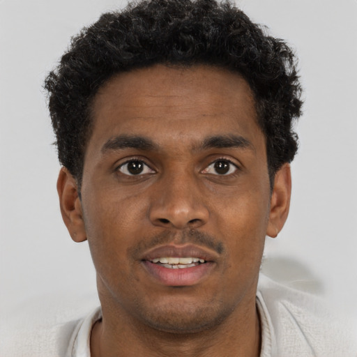 Neutral black young-adult male with short  brown hair and brown eyes