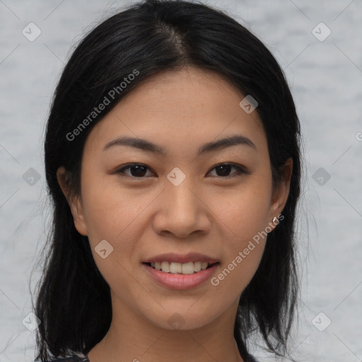 Joyful asian young-adult female with medium  black hair and brown eyes