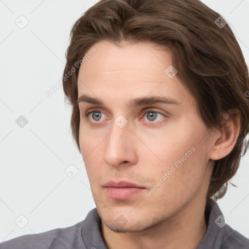 Neutral white young-adult male with short  brown hair and grey eyes