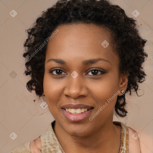 Joyful black young-adult female with medium  brown hair and brown eyes