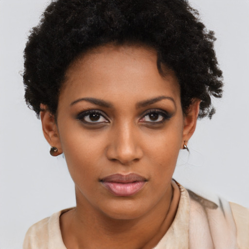 Neutral black young-adult female with short  brown hair and brown eyes