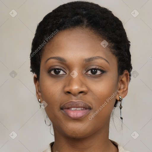 Joyful black young-adult female with short  black hair and brown eyes