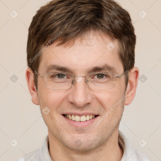 Joyful white adult male with short  brown hair and grey eyes