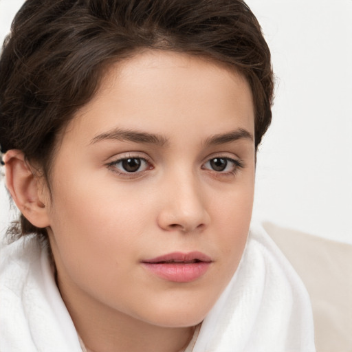 Neutral white child female with short  brown hair and brown eyes