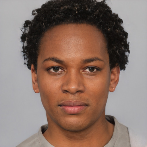 Neutral black young-adult female with short  black hair and brown eyes