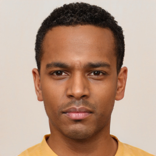 Neutral black young-adult male with short  black hair and brown eyes
