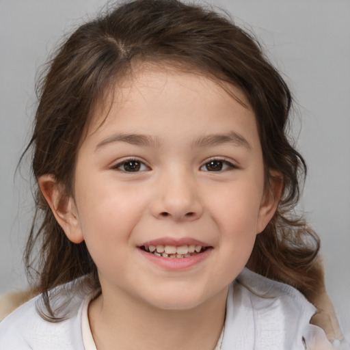 Joyful white child female with medium  brown hair and brown eyes